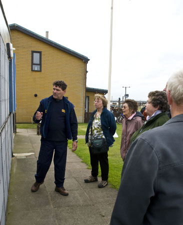 Dave Steenvoorden pointing out some of the Humber Lifeboat's rescues