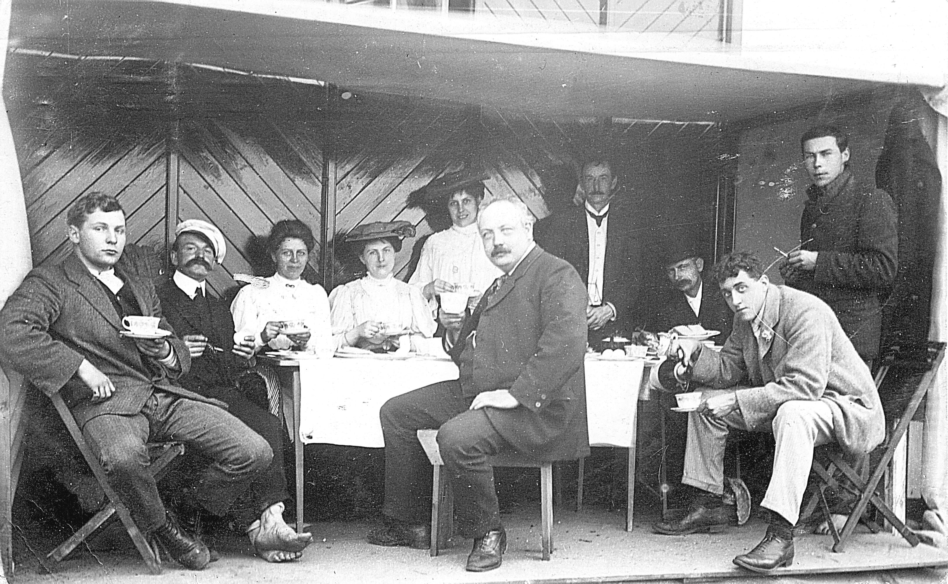 Dr William Coates and visitors in ‘Our Flat’